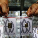 Harga Emas Antam Terjun Bebas, Turun Rp77.000 Per Gram!
